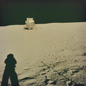 (APOLLO 11 MOON LANDING) Presentation album with 20 iconic photographs depicting the Apollo 11 Mission, featuring breathtaking views of